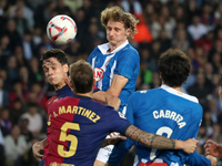 Alex Kral and Hector Font play during the match between FC Barcelona and RCD Espanyol, corresponding to week 12 of LaLiga EA Sports, at the...