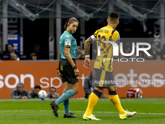 Lautaro Martinez and Ferrieri Caputi are in action during the Serie A match between FC Internazionale and Venezia FC at Giuseppe Meazza Stad...