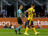 Lautaro Martinez and Ferrieri Caputi are in action during the Serie A match between FC Internazionale and Venezia FC at Giuseppe Meazza Stad...