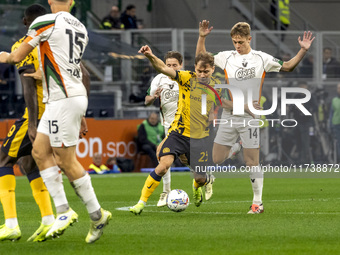 Nicolo Barella plays during the Serie A match between FC Internazionale and Venezia FC at Giuseppe Meazza Stadium in Milano, Italy, on Novem...