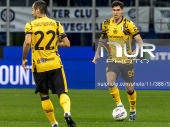 Alessandro Bastoni plays during the Serie A match between FC Internazionale and Venezia FC at Giuseppe Meazza Stadium in Milano, Italy, on N...