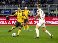 Henrikh Mkhitaryan plays during the Serie A match between FC Internazionale and Venezia FC at Giuseppe Meazza Stadium in Milano, Italy, on N...