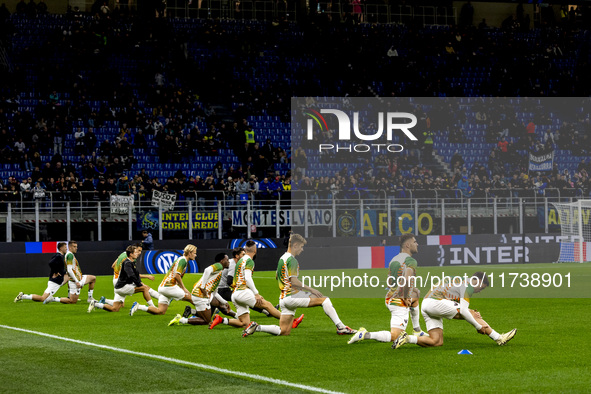 Venezia FC warms up before the Serie A match between FC Internazionale and Venezia FC at Giuseppe Meazza Stadium in Milano, Italy, on Novemb...