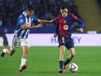 Pedri and Rafael Bauza play during the match between FC Barcelona and RCD Espanyol, corresponding to week 12 of LaLiga EA Sports, at the Llu...