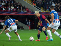 Dani Olmo, Carlos Romero, and Sergi Gomez play during the match between FC Barcelona and RCD Espanyol, corresponding to week 12 of LaLiga EA...