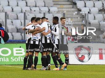 Players of U Cluj celebrate during the Supeliga match between Universitatea Cluj and Farul Constanta at Cluj Arena in Cluj, Romania, on Nove...