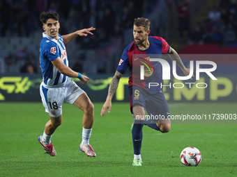 Inigo Martinez and Alvaro Aguado play during the match between FC Barcelona and RCD Espanyol, corresponding to week 12 of LaLiga EA Sports,...