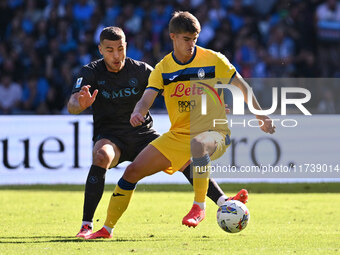 Alessandro Buongiorno of S.S.C. Napoli and Charles De Ketelaere of Atalanta B.C. are in action during the 11th day of the Serie A Championsh...