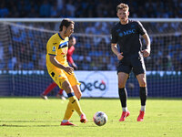 Marten de Roon of Atalanta B.C. and Scott McTominay of S.S.C. Napoli are in action during the 11th day of the Serie A Championship between S...