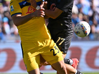 Sead Kolasinac of Atalanta B.C. and Khvicha Kvaratskhelia of S.S.C. Napoli are in action during the 11th day of the Serie A Championship bet...