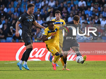 Amir Rrahmani of S.S.C. Napoli, Ademola Lookman of Atalanta B.C., and Giovanni Di Lorenzo of S.S.C. Napoli are in action during the 11th day...