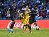 Amir Rrahmani of S.S.C. Napoli, Ademola Lookman of Atalanta B.C., and Giovanni Di Lorenzo of S.S.C. Napoli are in action during the 11th day...