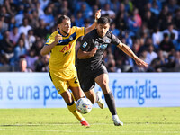 Lazar Samardzic of Atalanta B.C. and Giovanni Simeone of S.S.C. Napoli are in action during the 11th day of the Serie A Championship between...