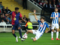 Lamine Yamal and Carlos Romero play during the match between FC Barcelona and RCD Espanyol, corresponding to week 12 of LaLiga EA Sports, at...