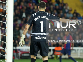 Joan Garcia plays during the match between FC Barcelona and RCD Espanyol, corresponding to week 12 of LaLiga EA Sports, at the Lluis Company...