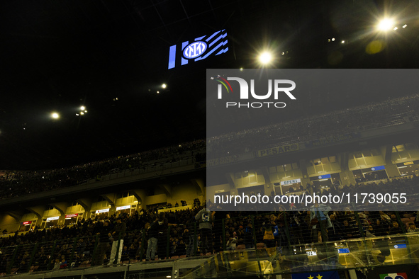 The action takes place during the Serie A match between FC Internazionale and Venezia FC at Giuseppe Meazza Stadium in Milano, Italy, on Nov...