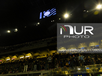 The action takes place during the Serie A match between FC Internazionale and Venezia FC at Giuseppe Meazza Stadium in Milano, Italy, on Nov...