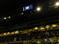 The action takes place during the Serie A match between FC Internazionale and Venezia FC at Giuseppe Meazza Stadium in Milano, Italy, on Nov...