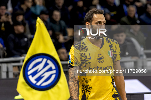 Hakan Calhanoglu plays during the Serie A match between FC Internazionale and Venezia FC at Giuseppe Meazza Stadium in Milano, Italy, on Nov...