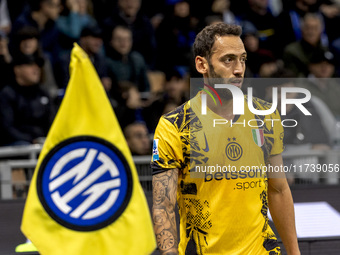 Hakan Calhanoglu plays during the Serie A match between FC Internazionale and Venezia FC at Giuseppe Meazza Stadium in Milano, Italy, on Nov...