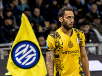 Hakan Calhanoglu plays during the Serie A match between FC Internazionale and Venezia FC at Giuseppe Meazza Stadium in Milano, Italy, on Nov...