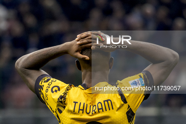 Marcus Thuram plays during the Serie A match between FC Internazionale and Venezia FC at Giuseppe Meazza Stadium in Milano, Italy, on Novemb...