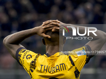 Marcus Thuram plays during the Serie A match between FC Internazionale and Venezia FC at Giuseppe Meazza Stadium in Milano, Italy, on Novemb...