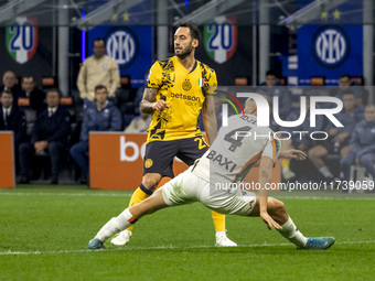 Hakan Calhanoglu plays during the Serie A match between FC Internazionale and Venezia FC at Giuseppe Meazza Stadium in Milano, Italy, on Nov...