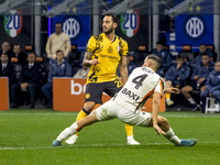 Hakan Calhanoglu plays during the Serie A match between FC Internazionale and Venezia FC at Giuseppe Meazza Stadium in Milano, Italy, on Nov...