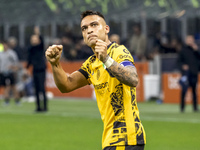 Lautaro Martinez celebrates after scoring a goal during the Serie A football match between FC Internazionale and Venezia FC at Giuseppe Meaz...