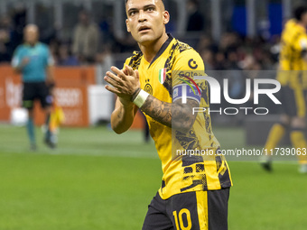 Lautaro Martinez celebrates after scoring a goal during the Serie A football match between FC Internazionale and Venezia FC at Giuseppe Meaz...