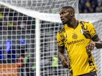 Marcus Thuram plays during the Serie A match between FC Internazionale and Venezia FC at Giuseppe Meazza Stadium in Milano, Italy, on Novemb...