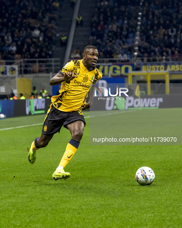 Marcus Thuram plays during the Serie A match between FC Internazionale and Venezia FC at Giuseppe Meazza Stadium in Milano, Italy, on Novemb...