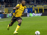 Marcus Thuram plays during the Serie A match between FC Internazionale and Venezia FC at Giuseppe Meazza Stadium in Milano, Italy, on Novemb...