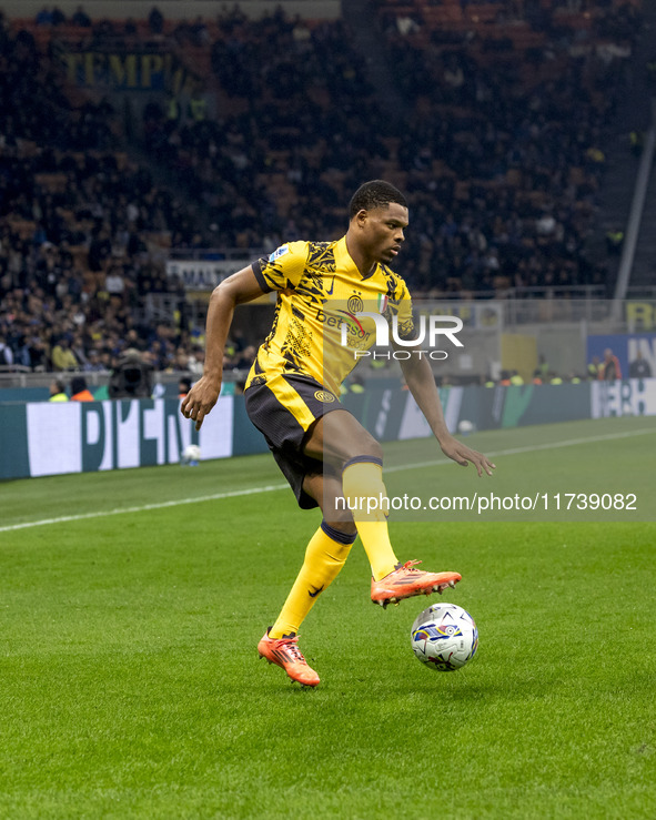 Denzel Dumfries plays during the Serie A match between FC Internazionale and Venezia FC at Giuseppe Meazza Stadium in Milano, Italy, on Nove...