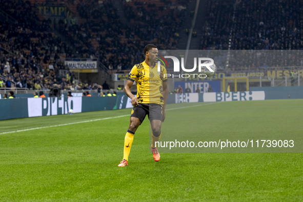 Denzel Dumfries plays during the Serie A match between FC Internazionale and Venezia FC at Giuseppe Meazza Stadium in Milano, Italy, on Nove...