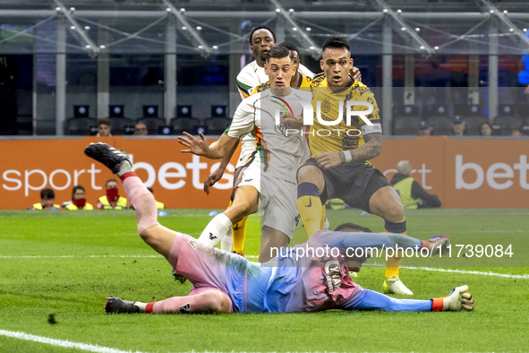 Filip Stankovic and Lautaro Martinez are in action during the Serie A match between FC Internazionale and Venezia FC at Giuseppe Meazza Stad...