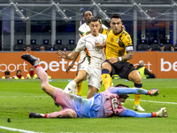 Filip Stankovic and Lautaro Martinez are in action during the Serie A match between FC Internazionale and Venezia FC at Giuseppe Meazza Stad...