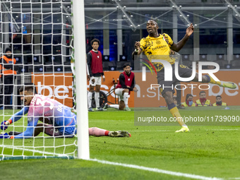 Marcus Thuram plays during the Serie A match between FC Internazionale and Venezia FC at Giuseppe Meazza Stadium in Milano, Italy, on Novemb...