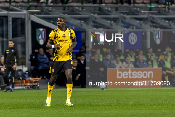 Marcus Thuram plays during the Serie A match between FC Internazionale and Venezia FC at Giuseppe Meazza Stadium in Milano, Italy, on Novemb...