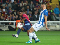 Ansu Fati and Sergi Gomez play during the match between FC Barcelona and RCD Espanyol, corresponding to week 12 of LaLiga EA Sports, at the...