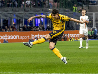 Alessandro Bastoni plays during the Serie A match between FC Internazionale and Venezia FC at Giuseppe Meazza Stadium in Milano, Italy, on N...