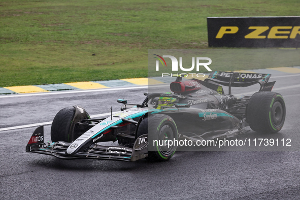 Lewis Hamilton of the UK drives the (44) Mercedes-AMG Petronas F1 Team F1 W15 E Performance Mercedes during the Formula 1 Lenovo Grande Prem...