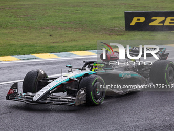 Lewis Hamilton of the UK drives the (44) Mercedes-AMG Petronas F1 Team F1 W15 E Performance Mercedes during the Formula 1 Lenovo Grande Prem...