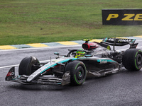 Lewis Hamilton of the UK drives the (44) Mercedes-AMG Petronas F1 Team F1 W15 E Performance Mercedes during the Formula 1 Lenovo Grande Prem...