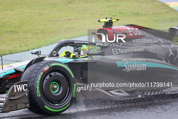 Lewis Hamilton of the UK drives the (44) Mercedes-AMG Petronas F1 Team F1 W15 E Performance Mercedes during the Formula 1 Lenovo Grande Prem...