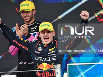 Max Verstappen of the Netherlands, winner of the race, drives the Oracle Red Bull Racing RB20 Honda RBPT during the Formula 1 Lenovo Grande...