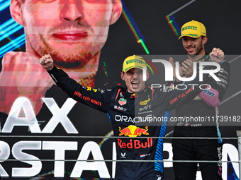 Max Verstappen of the Netherlands drives the Oracle Red Bull Racing RB20 Honda RBPT and wins the race on the podium during the Formula 1 Len...