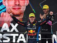 Max Verstappen of the Netherlands drives the Oracle Red Bull Racing RB20 Honda RBPT and wins the race on the podium during the Formula 1 Len...