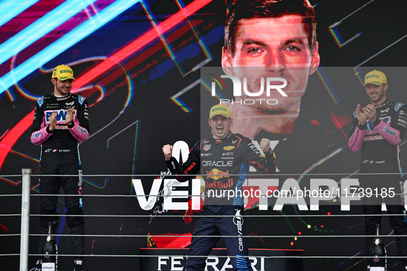 Max Verstappen of the Netherlands drives the Oracle Red Bull Racing RB20 Honda RBPT and wins the race on the podium during the Formula 1 Len...